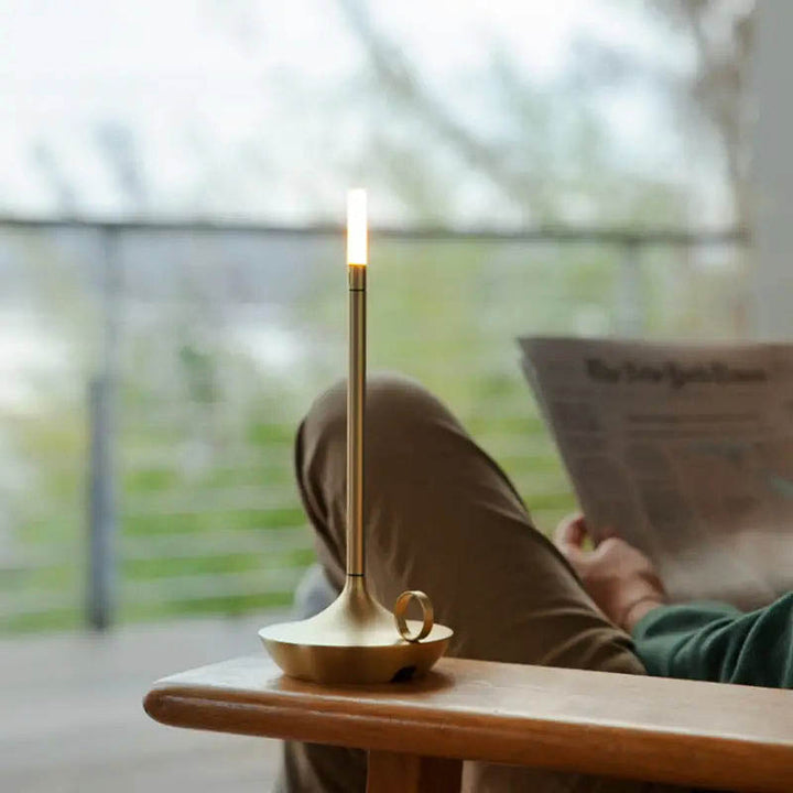 ALLADIN decorative cordless table lamp with a sleek modern design, USB rechargeable LED light, perfect for ambient lighting in any space.