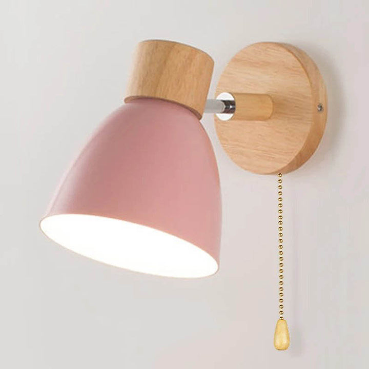 Pink Nordic wall lamp with natural wood backplate, minimalist light for living room or study