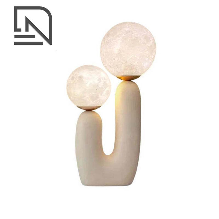 Decorative lamp with two spherical lights on a white background