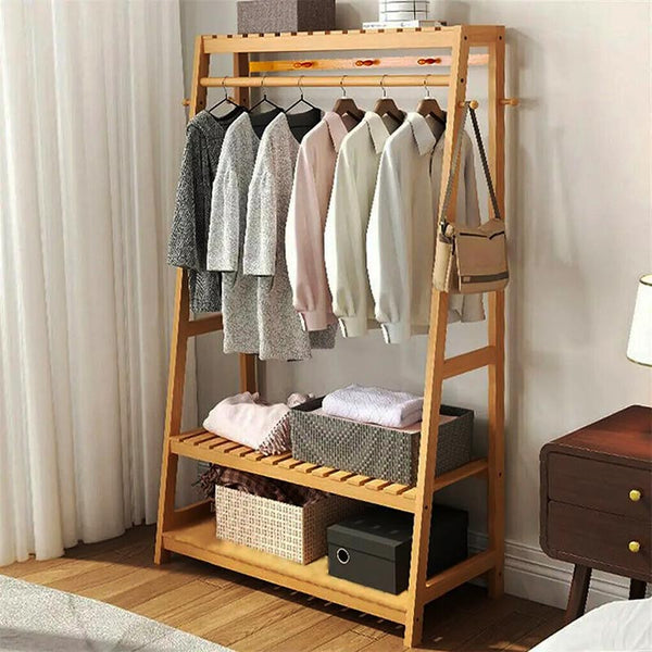 Freestanding bamboo clothes rack with 3-tier storage shelves and coat rail, ideal for modern UK bedrooms and entryways