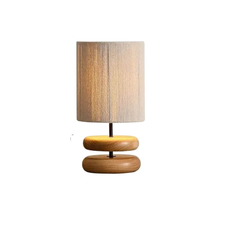 Ring boho table lamp with a Japandi-inspired natural wood base and fabric shade, perfect for cozy bedroom or living room lighting.