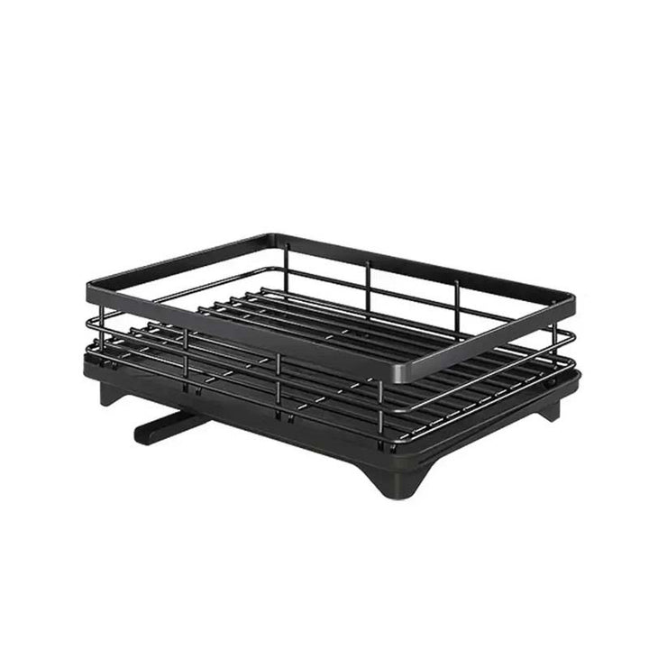 Black metal dish rack on a white background