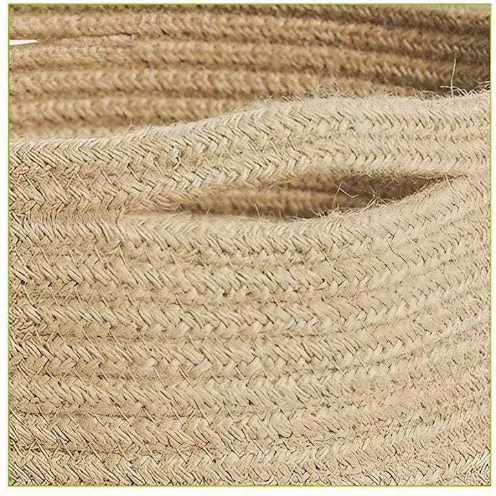 Close-up of natural jute weave texture, showing detailed craftsmanship of woven plant basket material.