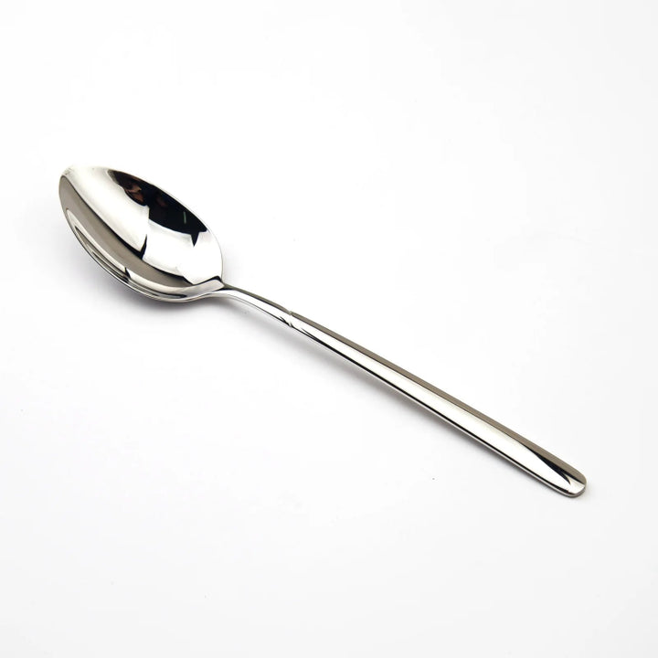 Silver spoon on a white background