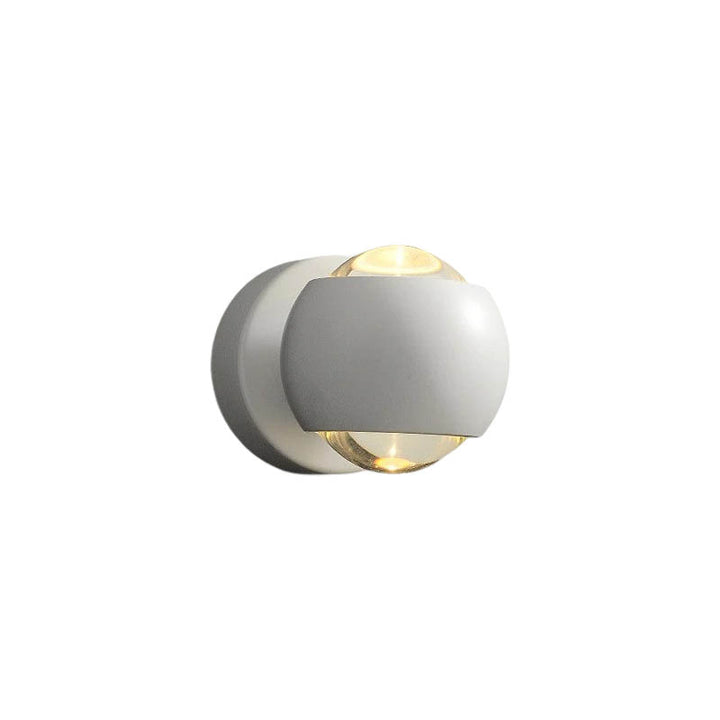 Matte white rotatable LED wall light with dual-sided illumination, featuring a modern spherical design for contemporary interiors and accent lighting.