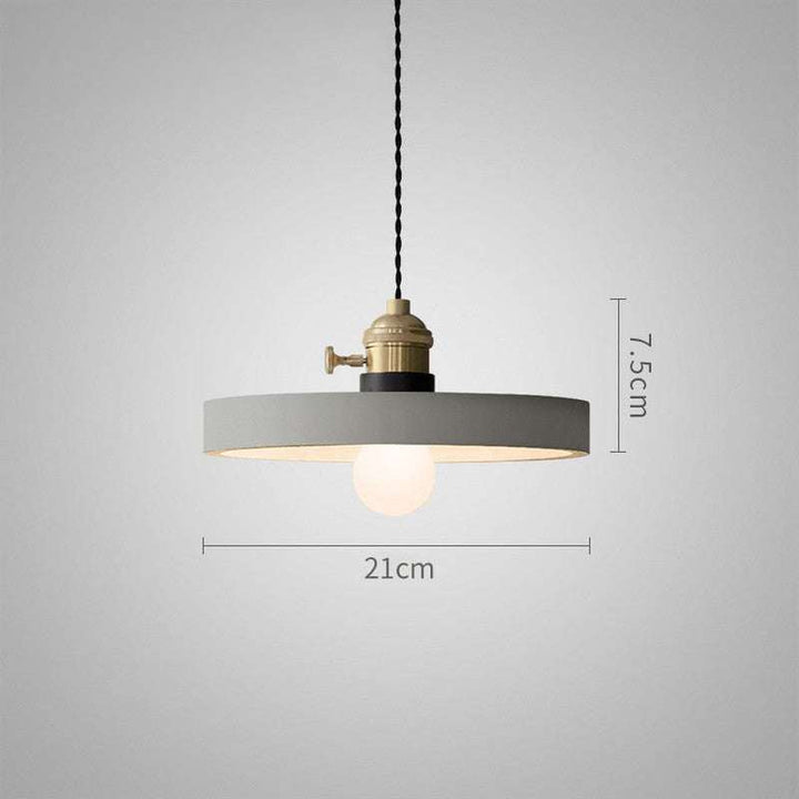 Flat round concrete pendant light, 21cm diameter with brass fitting and exposed bulb