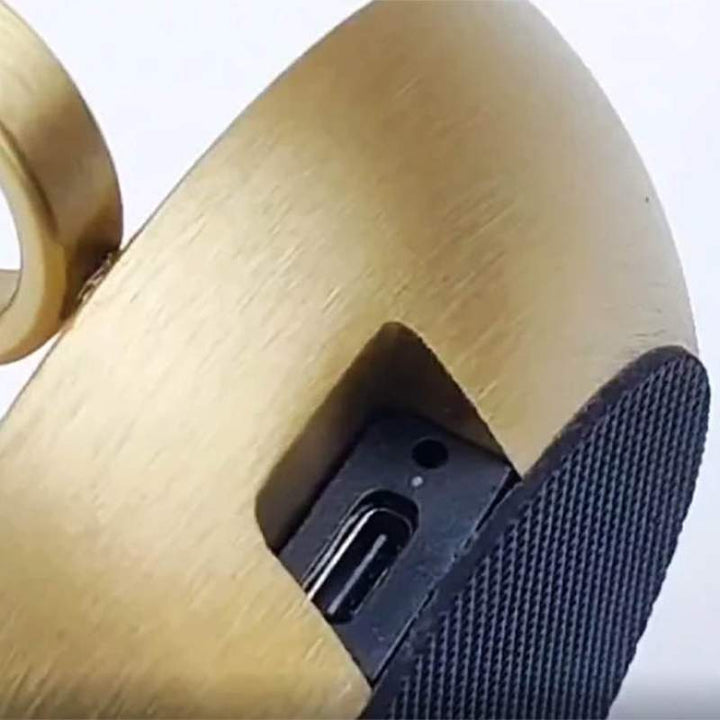 Detail of ALLADIN cordless LED lamp USB charging port with brushed gold finish – rechargeable, portable, and touch-activated.