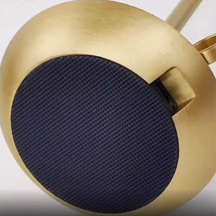 Brushed gold ALLADIN LED table lamp base with anti-slip pad and USB charging slot – compact, modern, and cordless design.