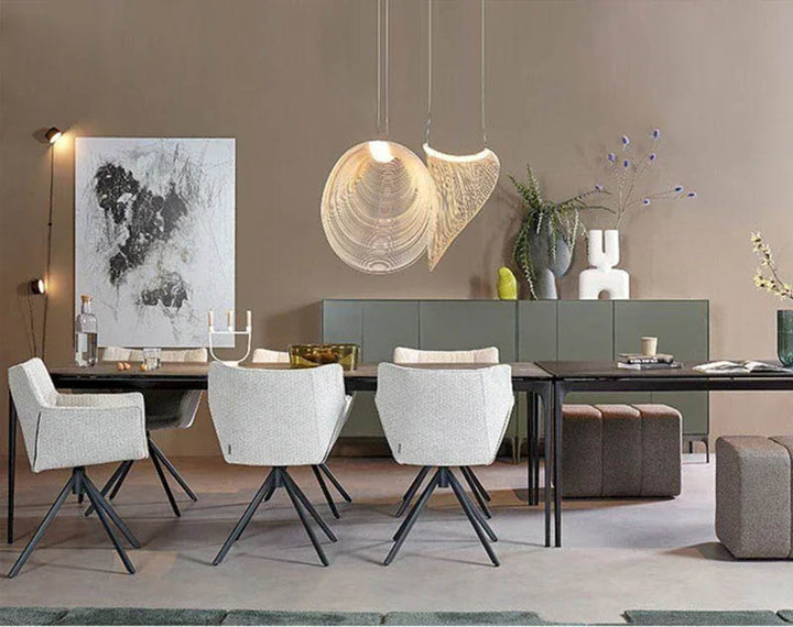 Beech wood pendant light styled in Nordic dining room, showcasing soft natural tones and minimalist interior lighting.