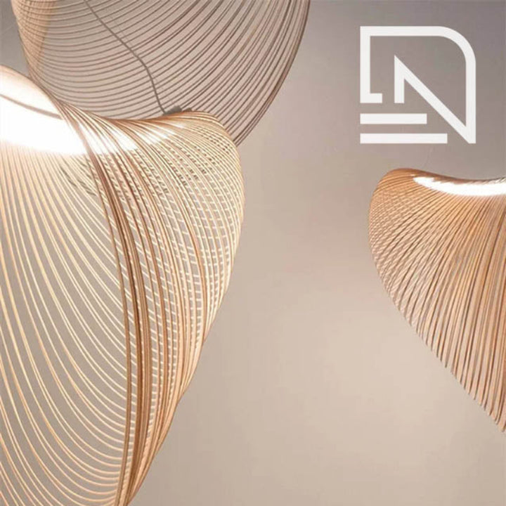 Group of three beech wood ENBIRK pendant lights in varying sizes, floating in modern Scandinavian room.