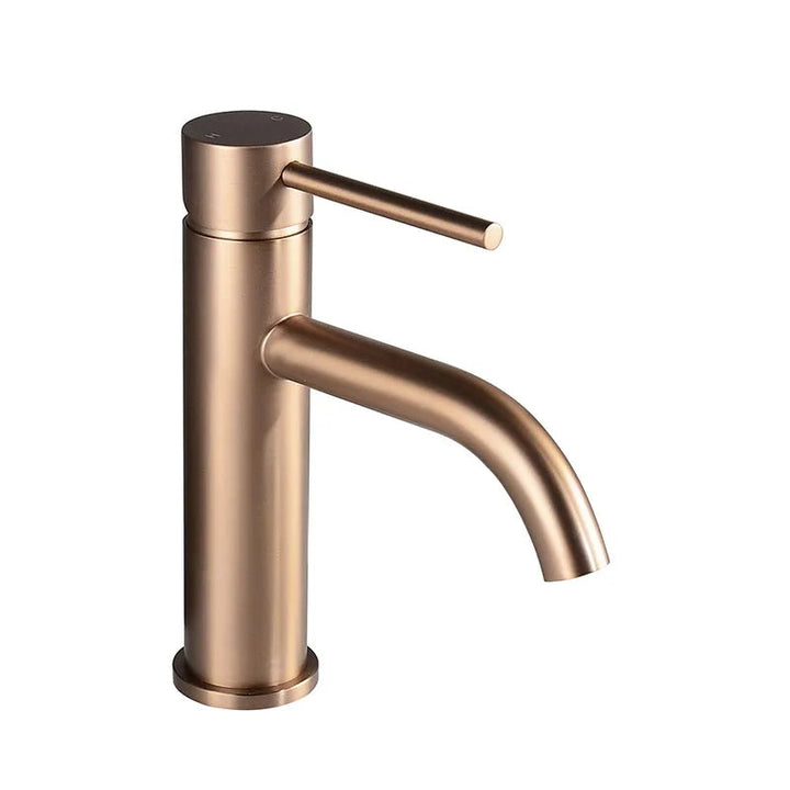 Brushed rose gold basin mixer tap with curved spout and single lever, minimalist design.