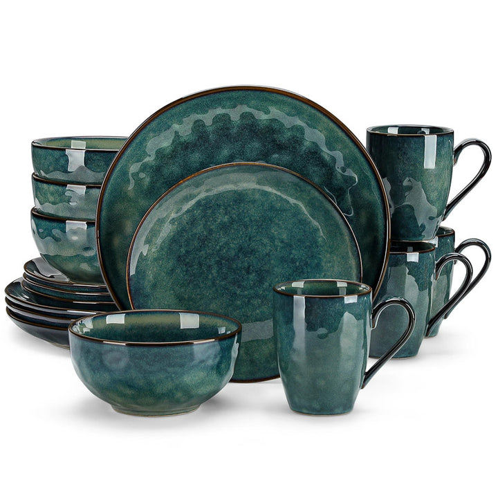 Set of teal ceramic dinnerware with black rims on a white background