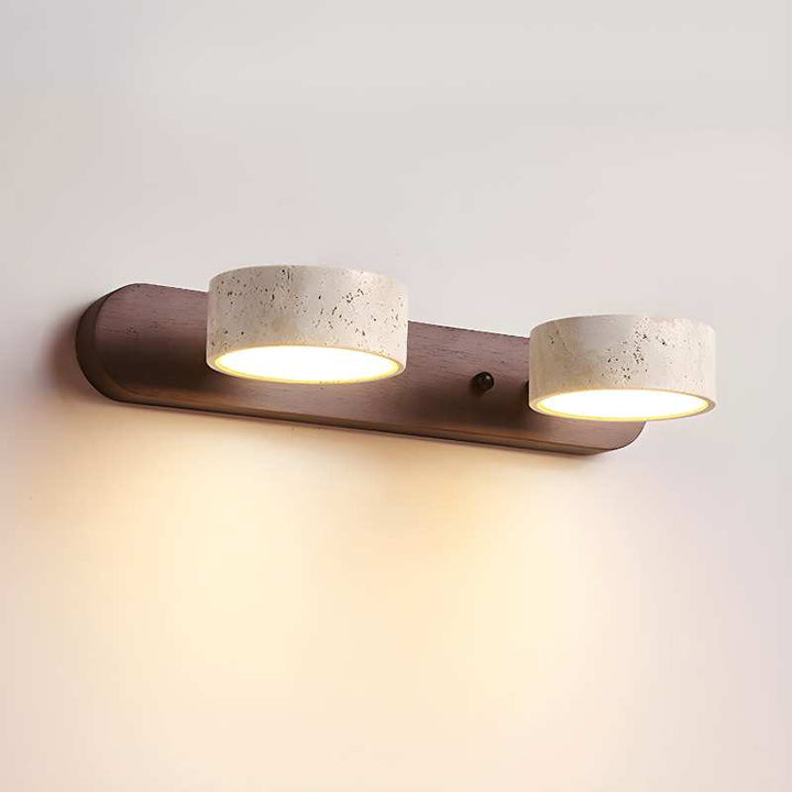 Modern wall-mounted light fixture with two concrete-textured lampshades on a plain background