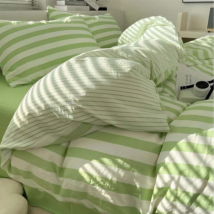 Light green and white striped duvet cover set with pillowcases, calm Nordic bedroom décor