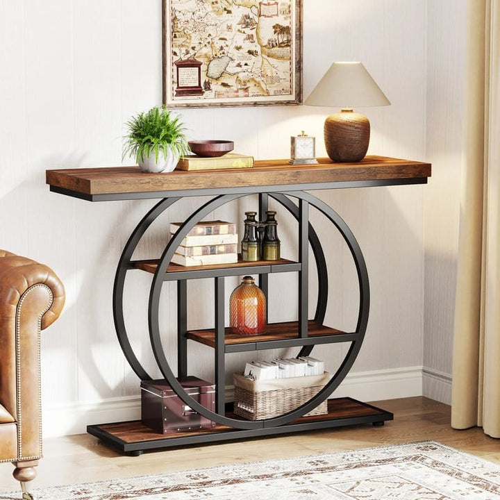 Industrial rustic console table with brown wood top, round black metal frame and four open shelves for entryway or living room.
