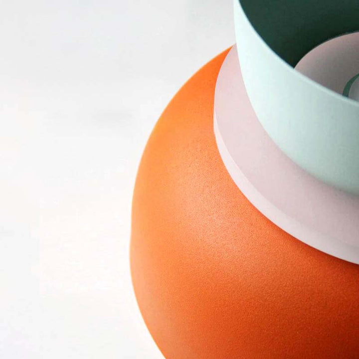 FARG Pendant Light Detail – Modern layered metal lampshade in orange, mint, pink and white showing premium colour finish