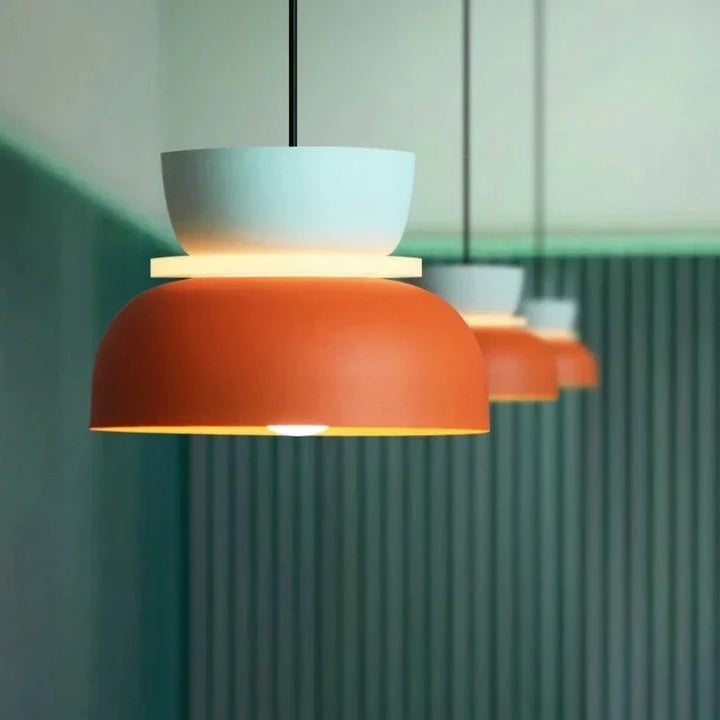 Close-up of the FARG Modern Macaron Pendant Light in orange and mint green, with matte finish and high-transmittance acrylic diffuser.