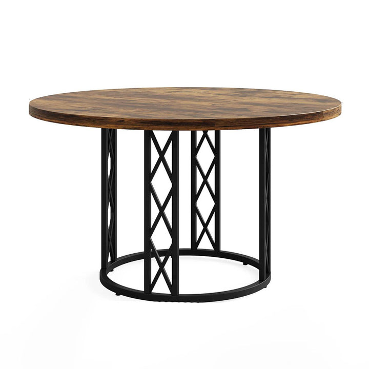 Round wooden table with black metal lattice base on a white background
