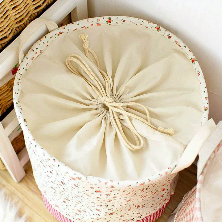 Floral cotton storage basket with drawstring top and handles, perfect for laundry, toys, or closet storage, Nordic Essentials UK