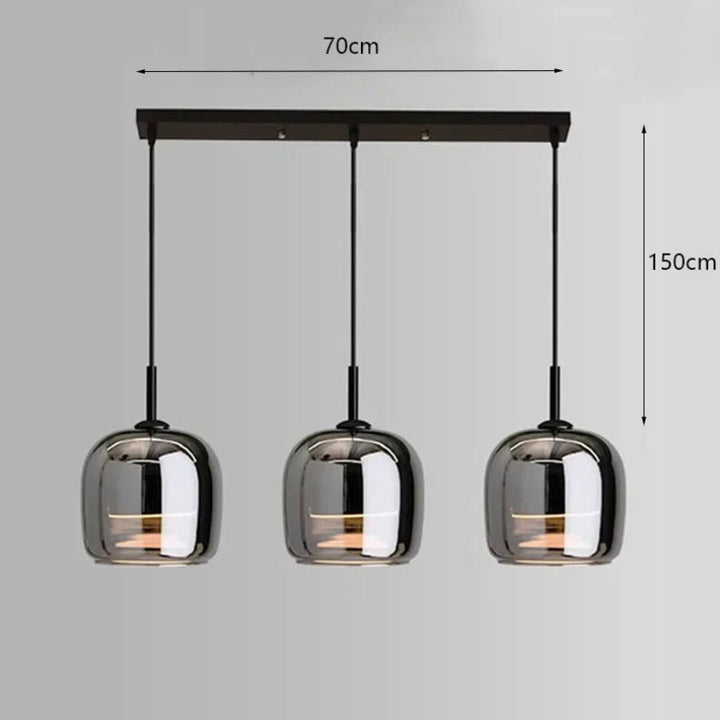 Three pendant lights with dimensions indicated on a gray background