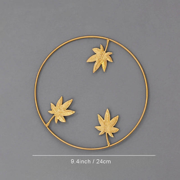 Polished metal Ginkgo leaf wall art by Nordic Essentials, measuring 9.4inch, ideal for modern home decor.ver7