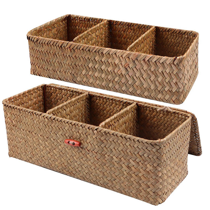 Two natural handwoven wicker storage baskets, each with three compartments, one with a lid and red toggle closure, for shelf organisation.