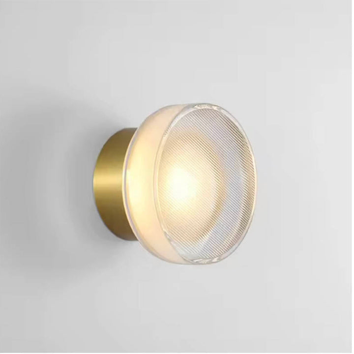 ILD glass wall sconce withwhitealuminium base and frosted lens, minimalist accent lighting for modern homes.