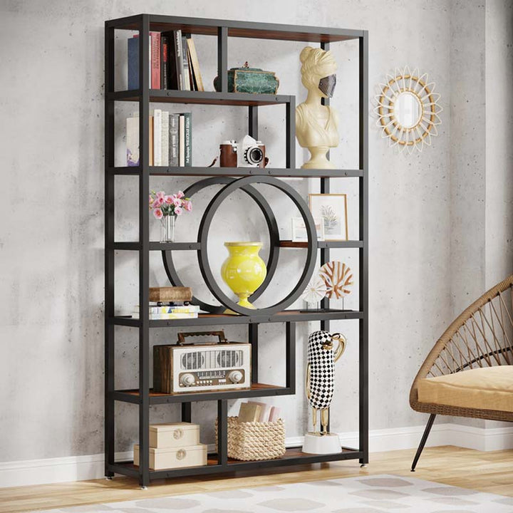 Black metal bookshelf with decorative items in a room with a chair and mirror.