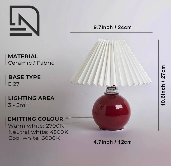 Modern table lamp with a pleated lampshade, elegant design, and soft ambient lighting, perfect for bedside tables, living rooms, or offices.