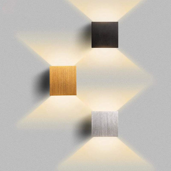 KUBE brushed black, gold and silver aluminium LED wall lamps with modern up and down light