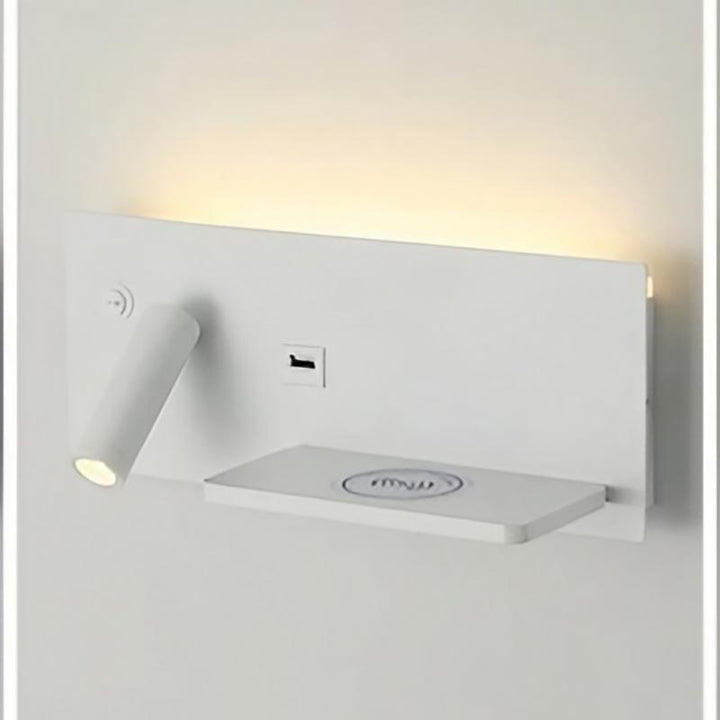 Modern wall-mounted light fixture with a shelf on a white background