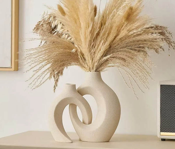 Nordic ceramic vase set of two, featuring a minimalist design in neutral tones, perfect for modern home décor and floral arrangements.