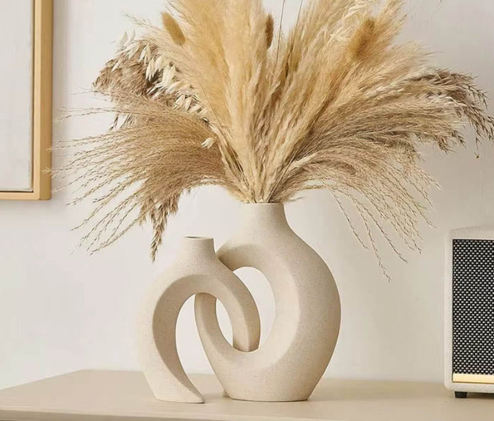 Nordic ceramic vase set of two, featuring a minimalist design in neutral tones, perfect for modern home décor and floral arrangements.