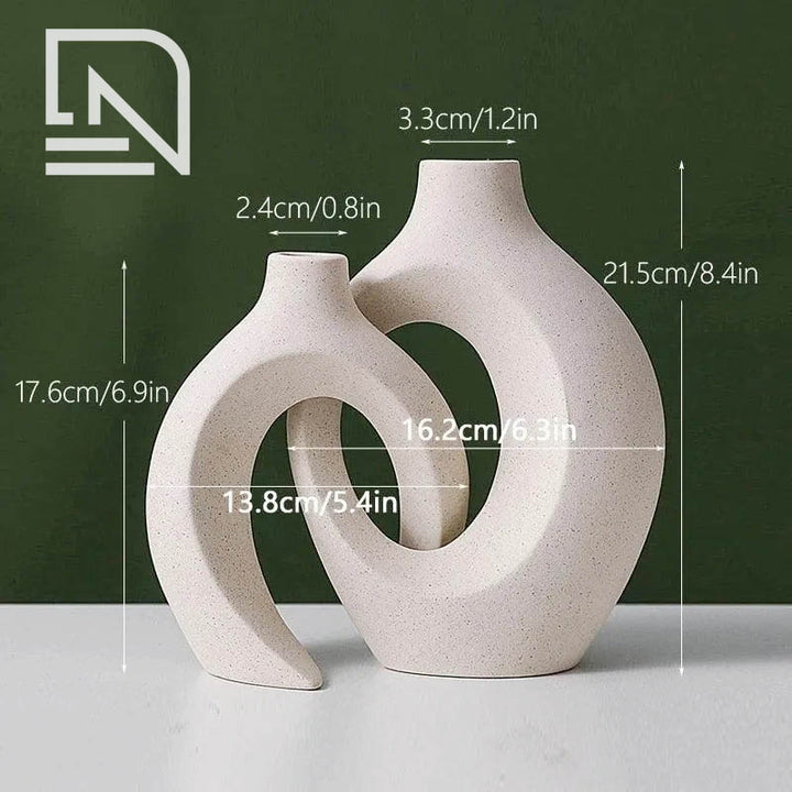 Nordic ceramic vase set of two, featuring a minimalist design in neutral tones, perfect for modern home décor and floral arrangements.