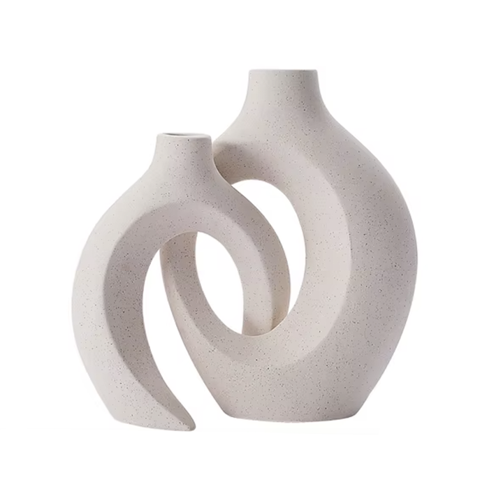 Nordic ceramic vase set of two, featuring a minimalist design in neutral tones, perfect for modern home décor and floral arrangements.