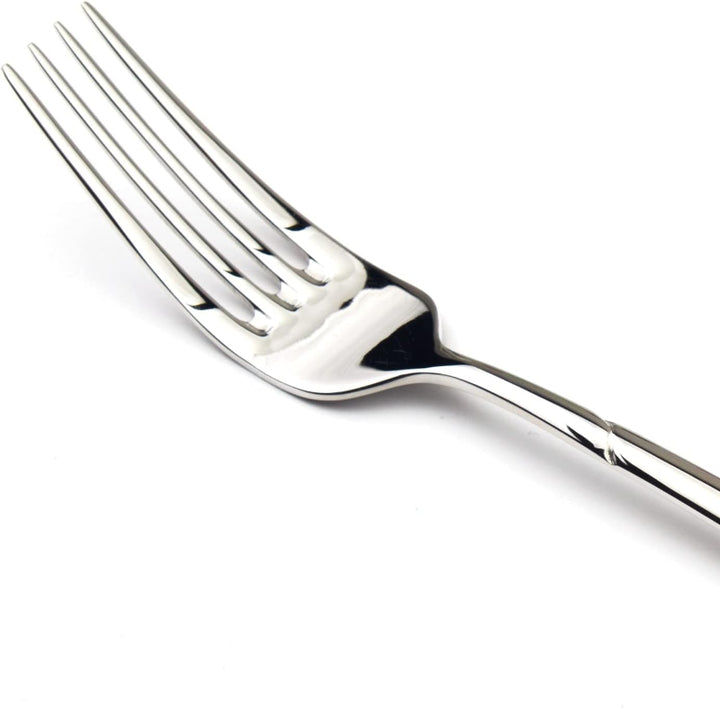 Silver fork on a white background