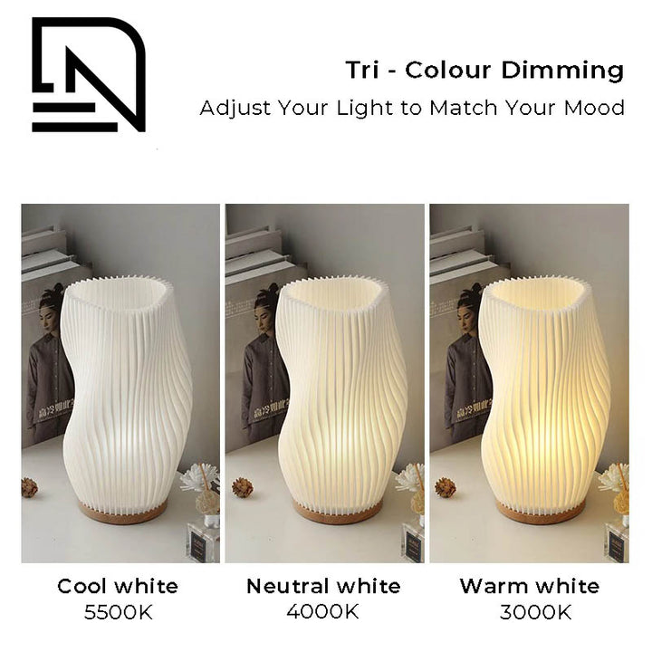Eco-friendly 3D-printed LED table lamp with tri-colour dimming, modern design, and warm ambient lighting for bedrooms, desks, and living spaces.