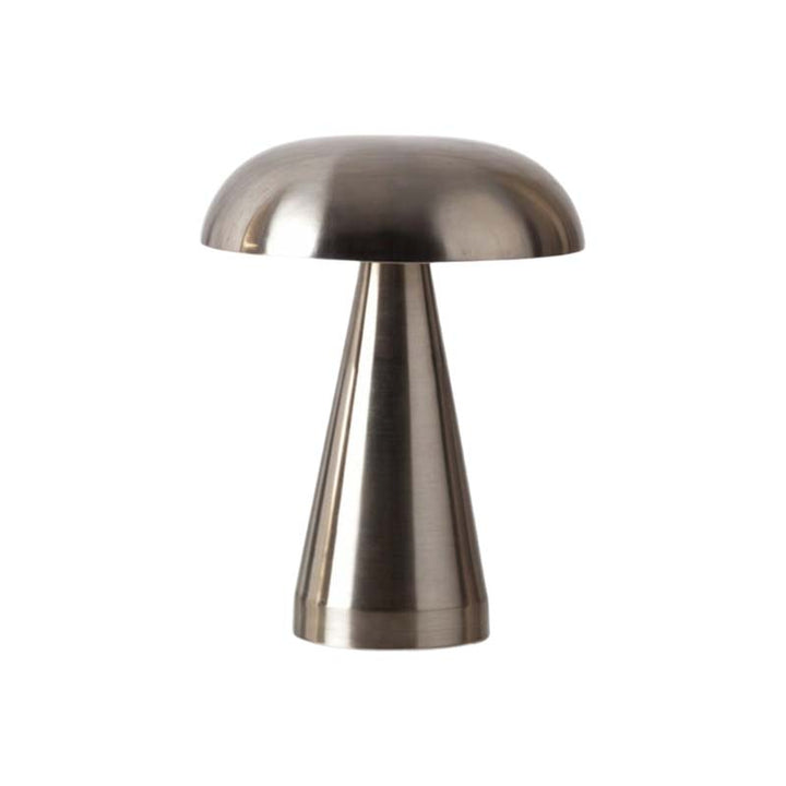Metallic cordless rechargeable table lamp on a white background