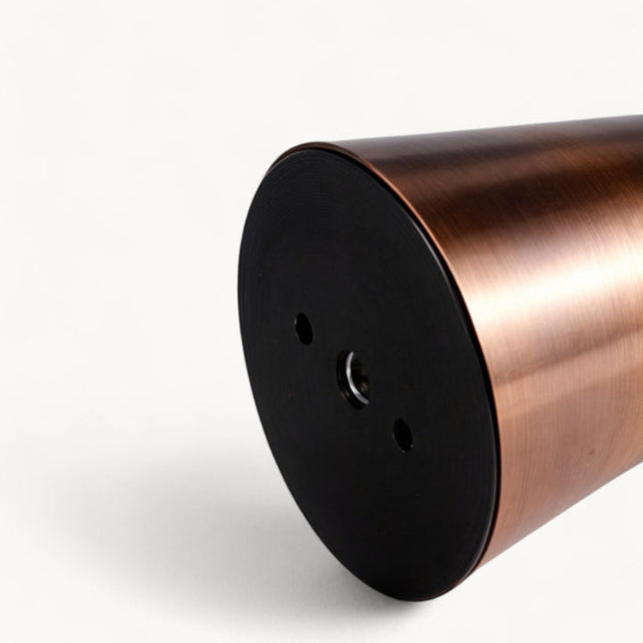 Black base detail of brushed copper rechargeable table lamp with charging port visible.