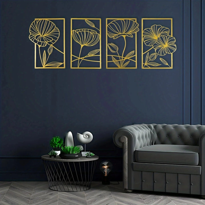 Decorative wall art with floral designs on a dark blue wall above a gray sofa.