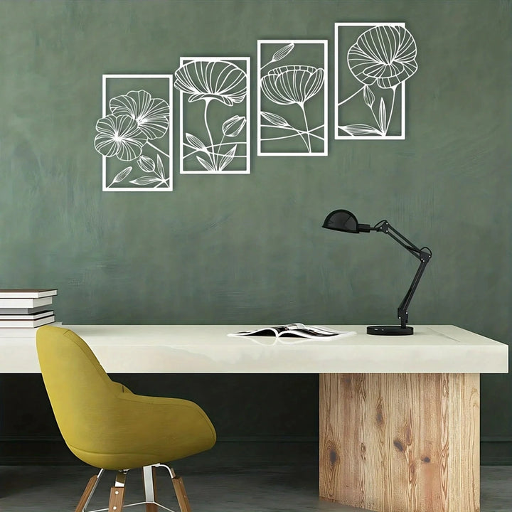Modern office setup with a desk, chair, and wall art on a green wall.