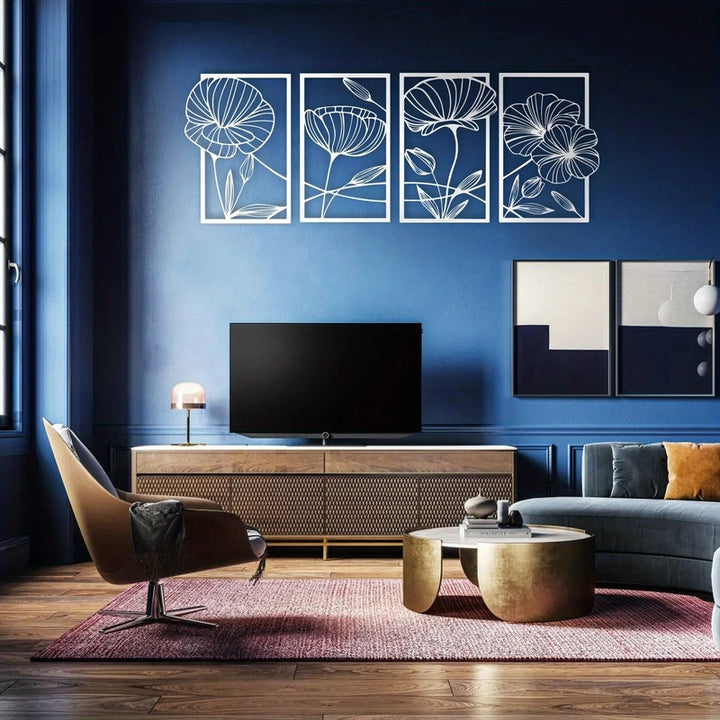 Modern living room with blue walls, floral wall art, and a gray sofa.
