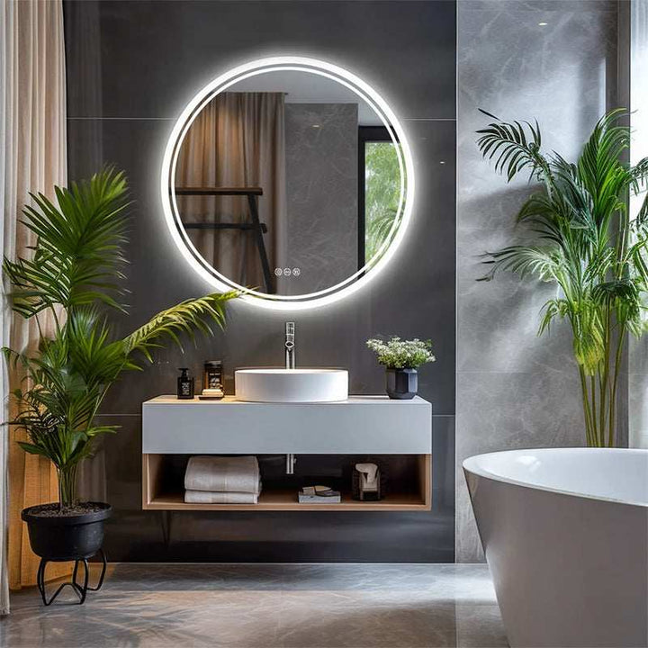 Contemporary grey bathroom featuring large round LED illuminated mirror above sink.