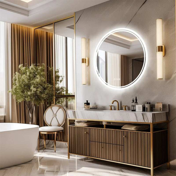 Elegant bathroom with marble vanity and gold accents, round anti-fog LED mirror.