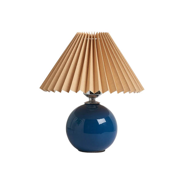 Modern table lamp with a pleated lampshade, elegant design, and soft ambient lighting, perfect for bedside tables, living rooms, or offices.