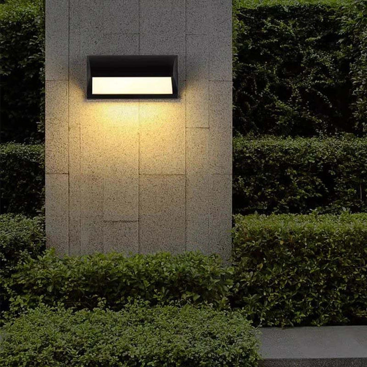 Nordic Essentials Motion Sensor Wall Light on hedge – IP66 waterproof black LED lamp for UK driveway, patio, and porch security