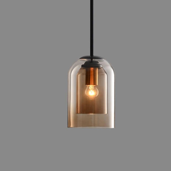 Amber glass double shade pendant light with vintage bulb