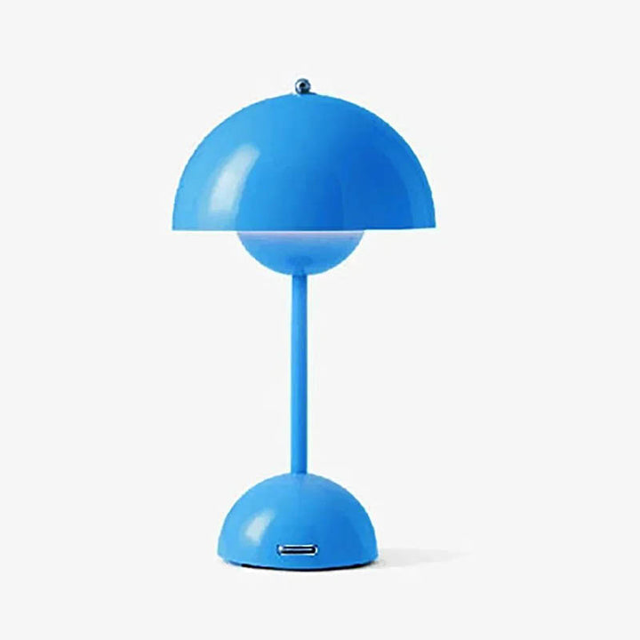 Blue, cordless rechargeable dome table lamp with USB port, modern minimalist design, shown on a white background.