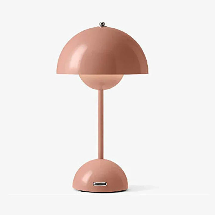 Pink cordless rechargeable dome table lamp with USB port, modern minimalist design, shown on a white background.