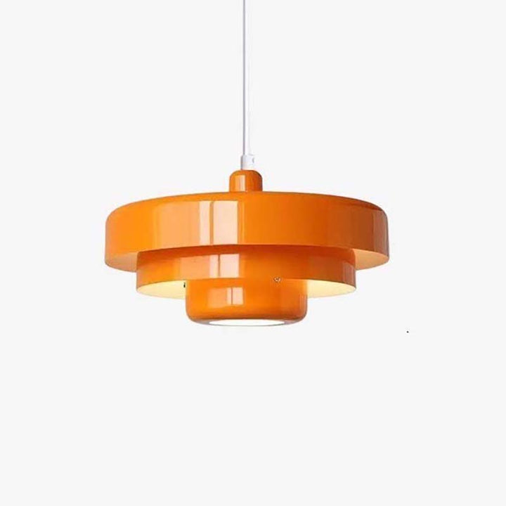 Orange SKIVE pendant light with layered metal shade, Scandinavian retro style, perfect for UK dining or kitchen lighting